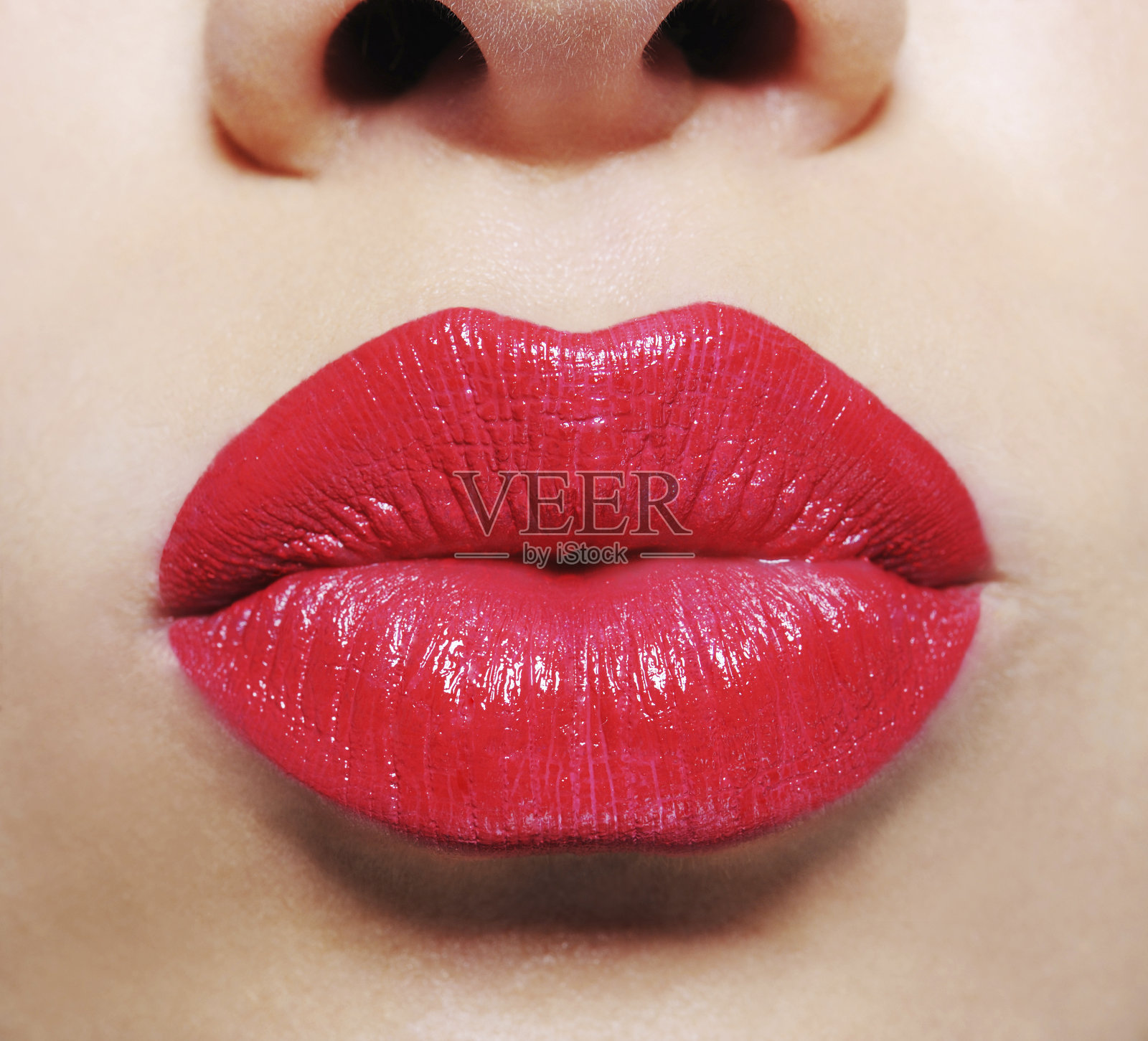 鲜红的女性嘴唇照片摄影图片