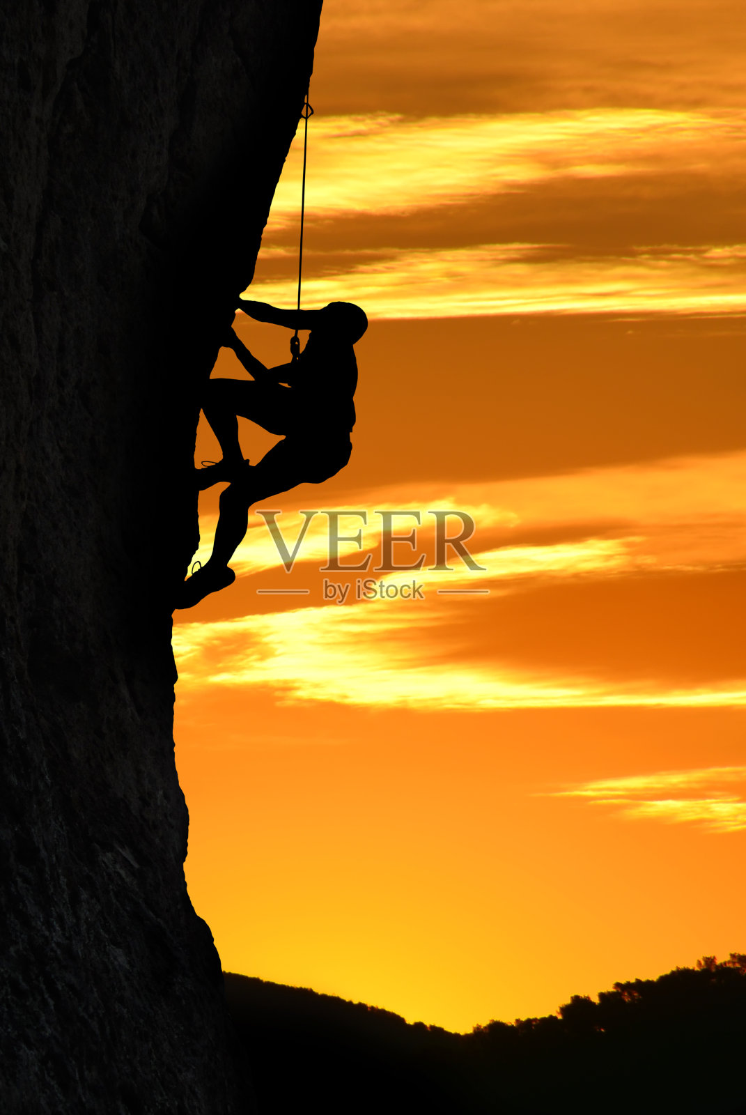 美丽的日落上一个登山者的剪影照片摄影图片