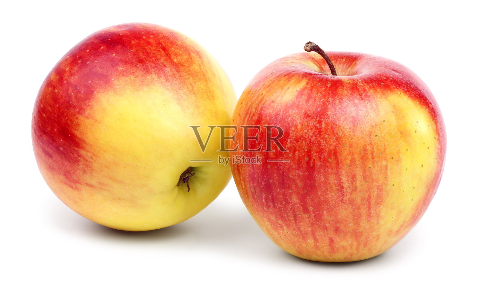 两个成熟的红黄苹果。照片摄影图片