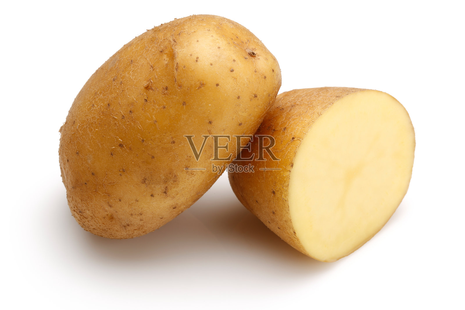 生土豆和半土豆照片摄影图片