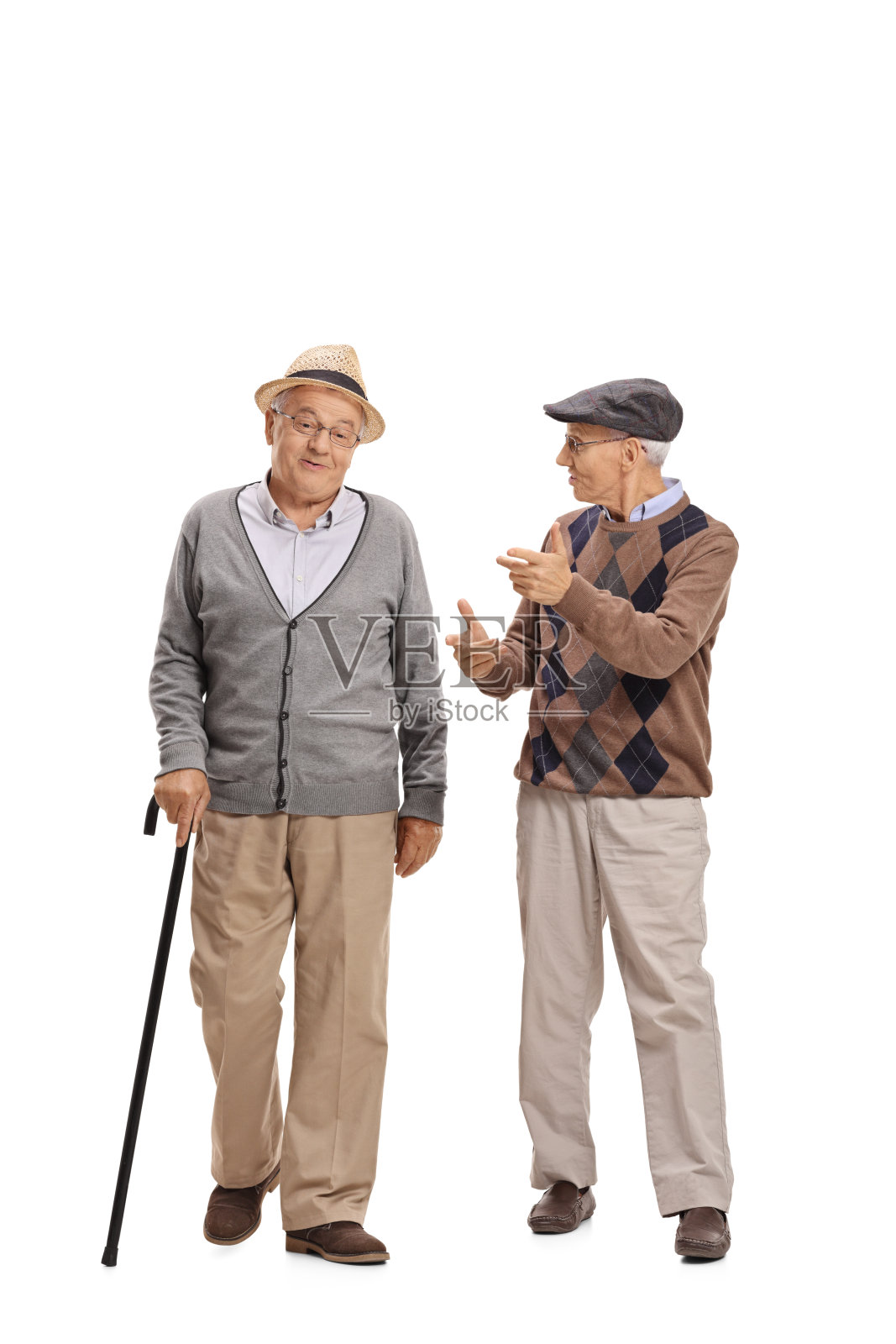 两个上了年纪的男人走向摄像机并交谈着照片摄影图片