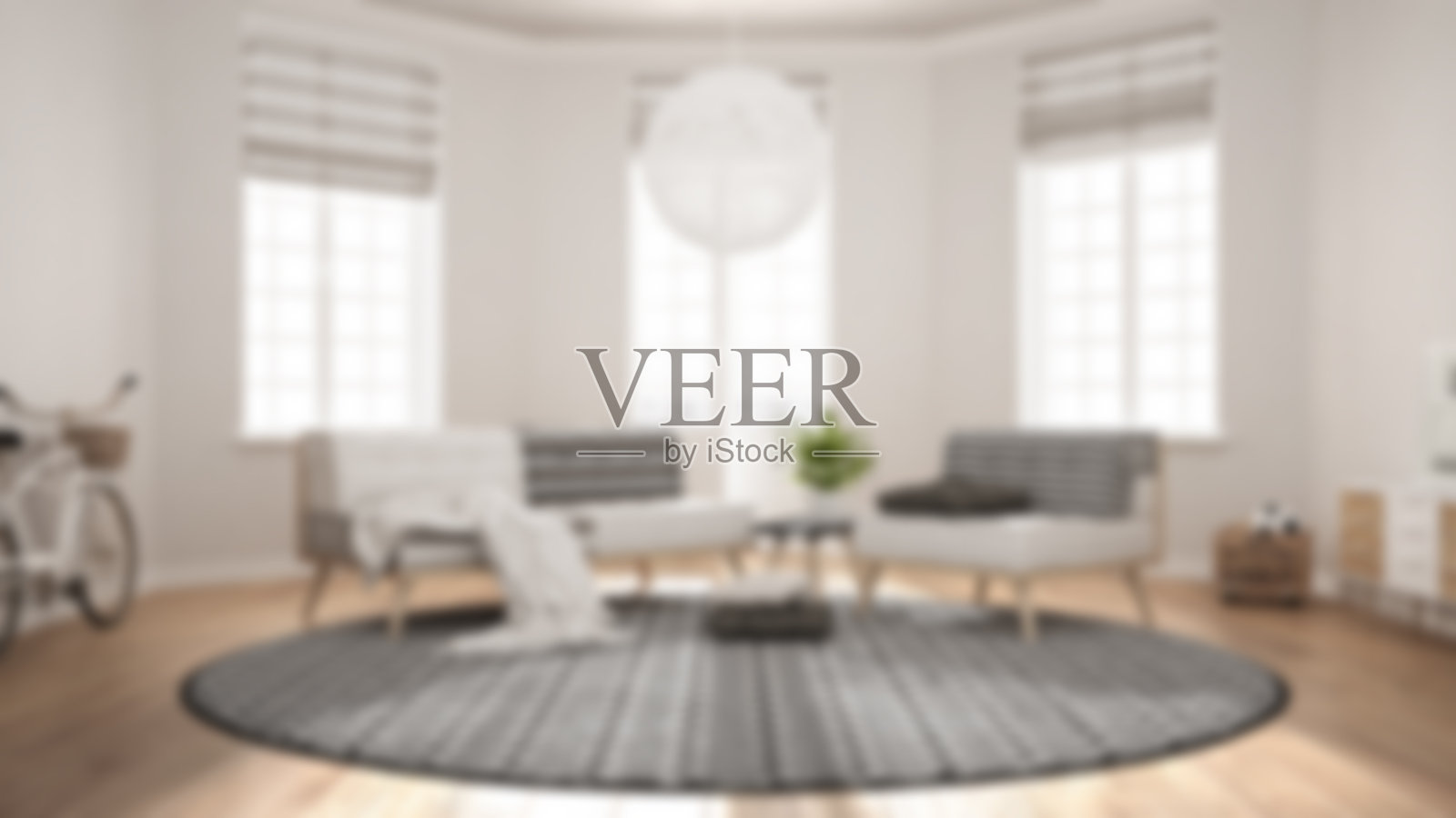 模糊的背景室内设计，斯堪的纳维亚极简主义客厅沙发，扶手椅和地毯照片摄影图片