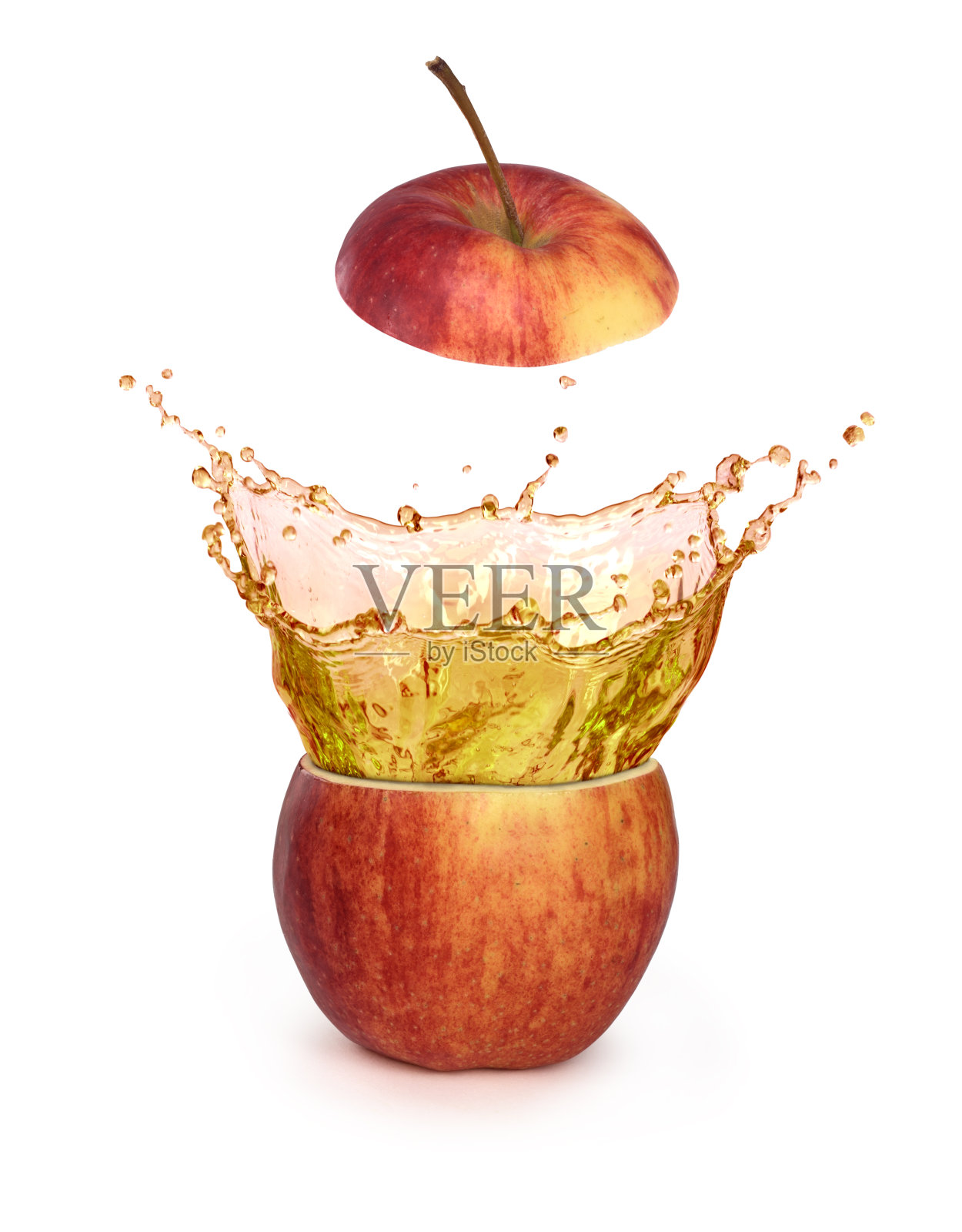 苹果汁飞溅内红苹果隔离，鲜榨果汁概念照片摄影图片