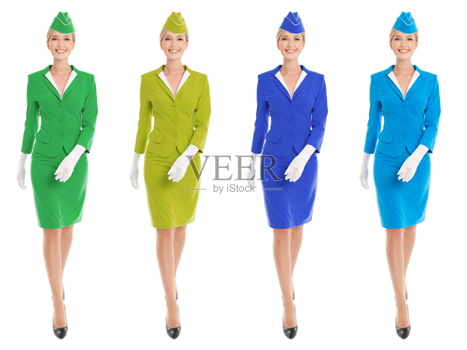 迷人的空姐穿着制服和不同的颜色。隔离照片摄影图片