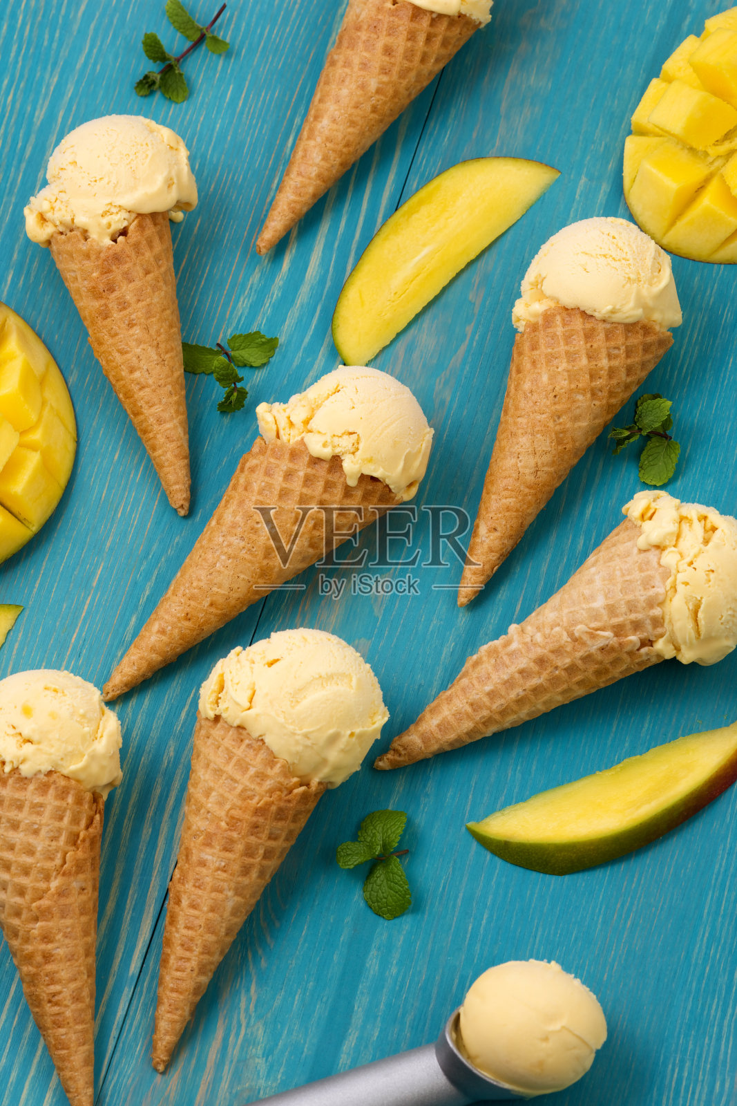 芒果冰淇淋甜筒的质地照片摄影图片