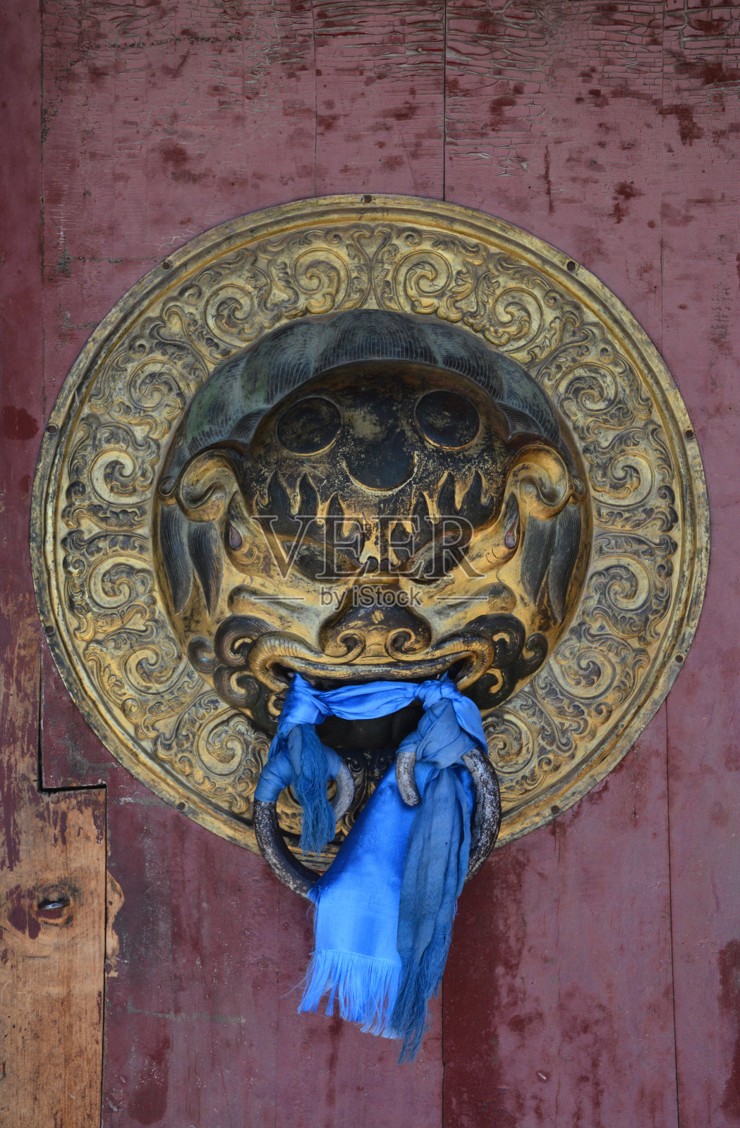 佛寺的狮子形门把手照片摄影图片