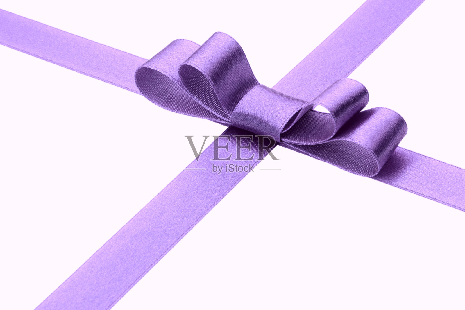 节日的淡紫色礼物丝带和蝴蝶结孤立在白色的背景照片摄影图片