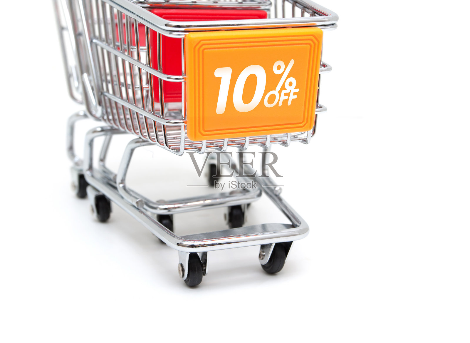 购物销售- 10%的折扣与购物车孤立的白色背景照片摄影图片