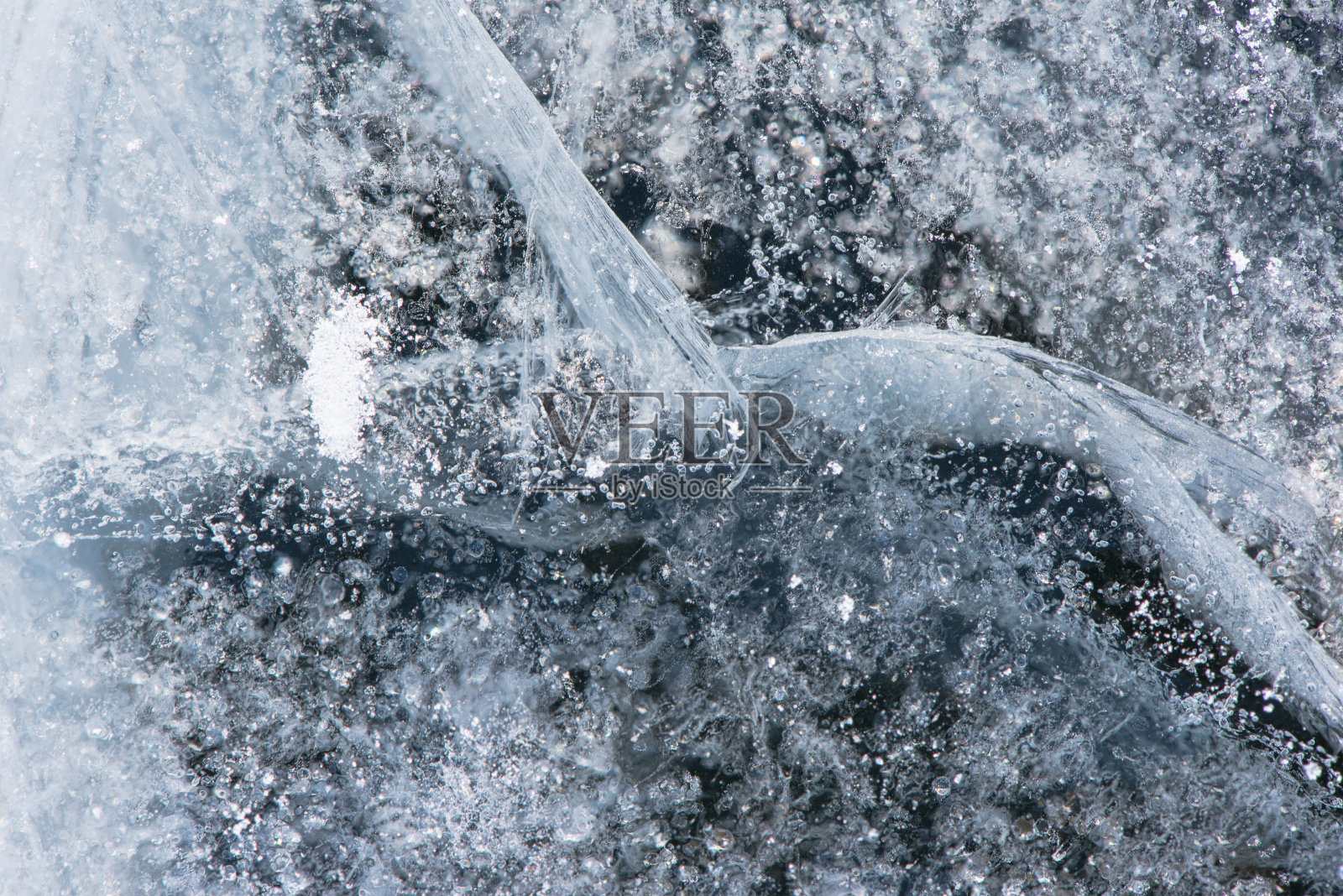 冰冻的湖裂缝在冰抽象的模式照片摄影图片