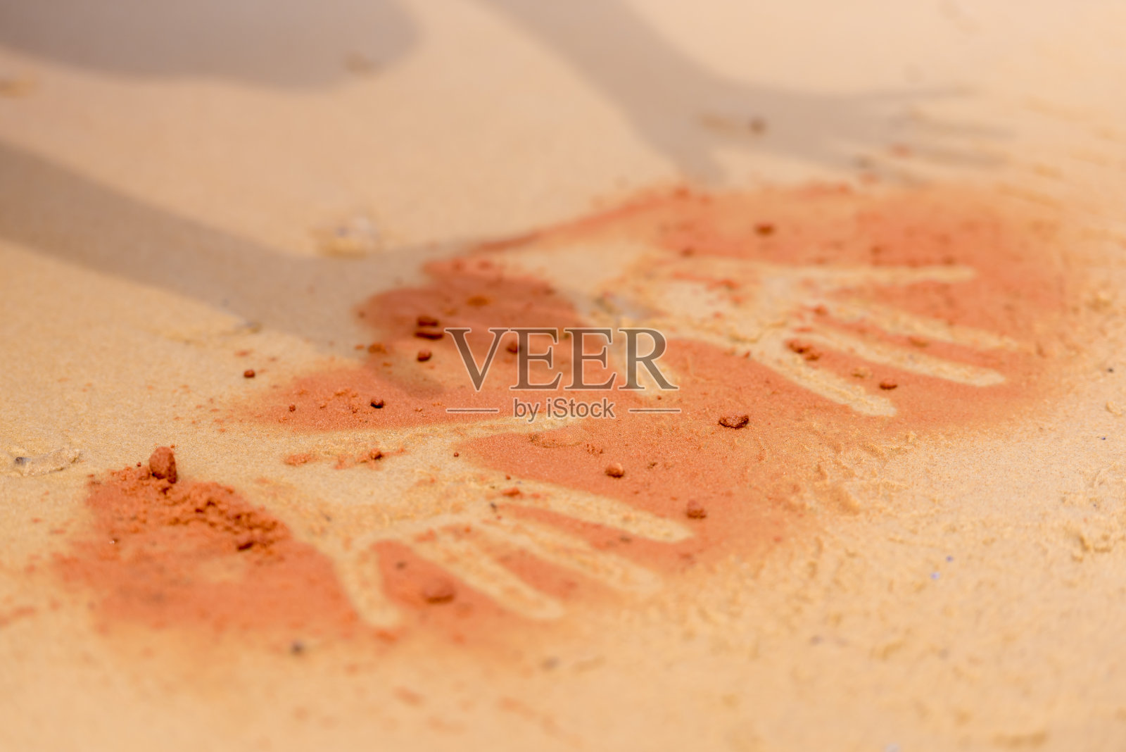 红土手形沙在土著艺术风格照片摄影图片