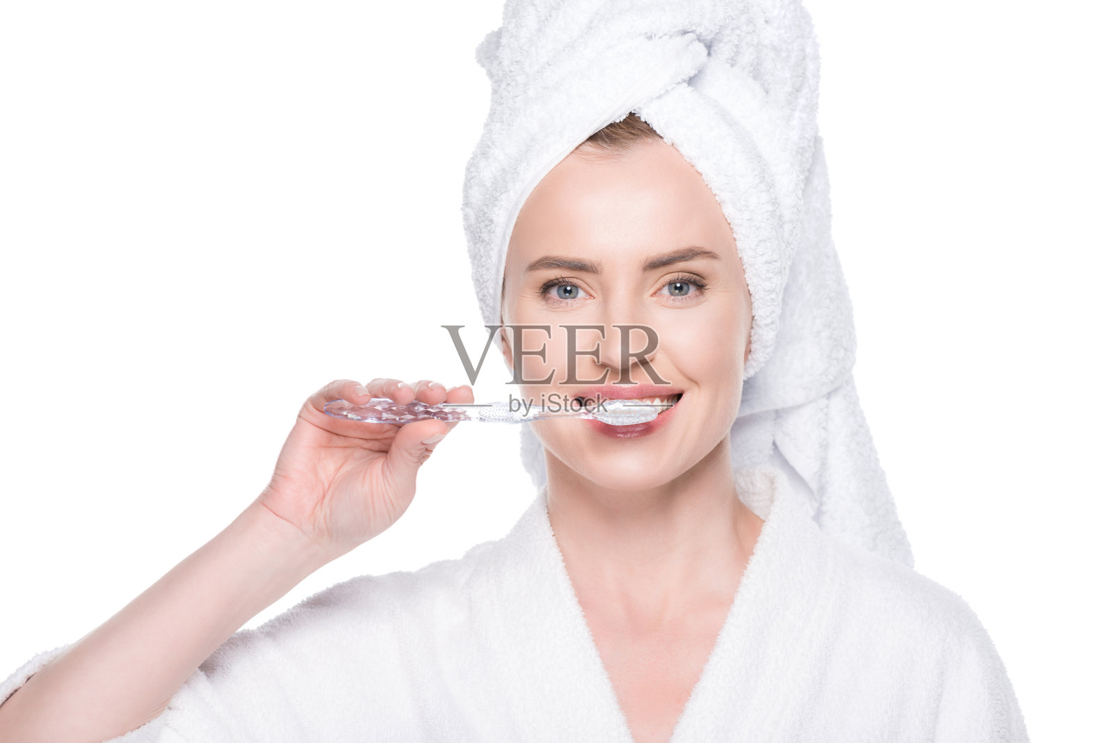 女人用干净的皮肤刷牙牙齿孤立白色照片摄影图片
