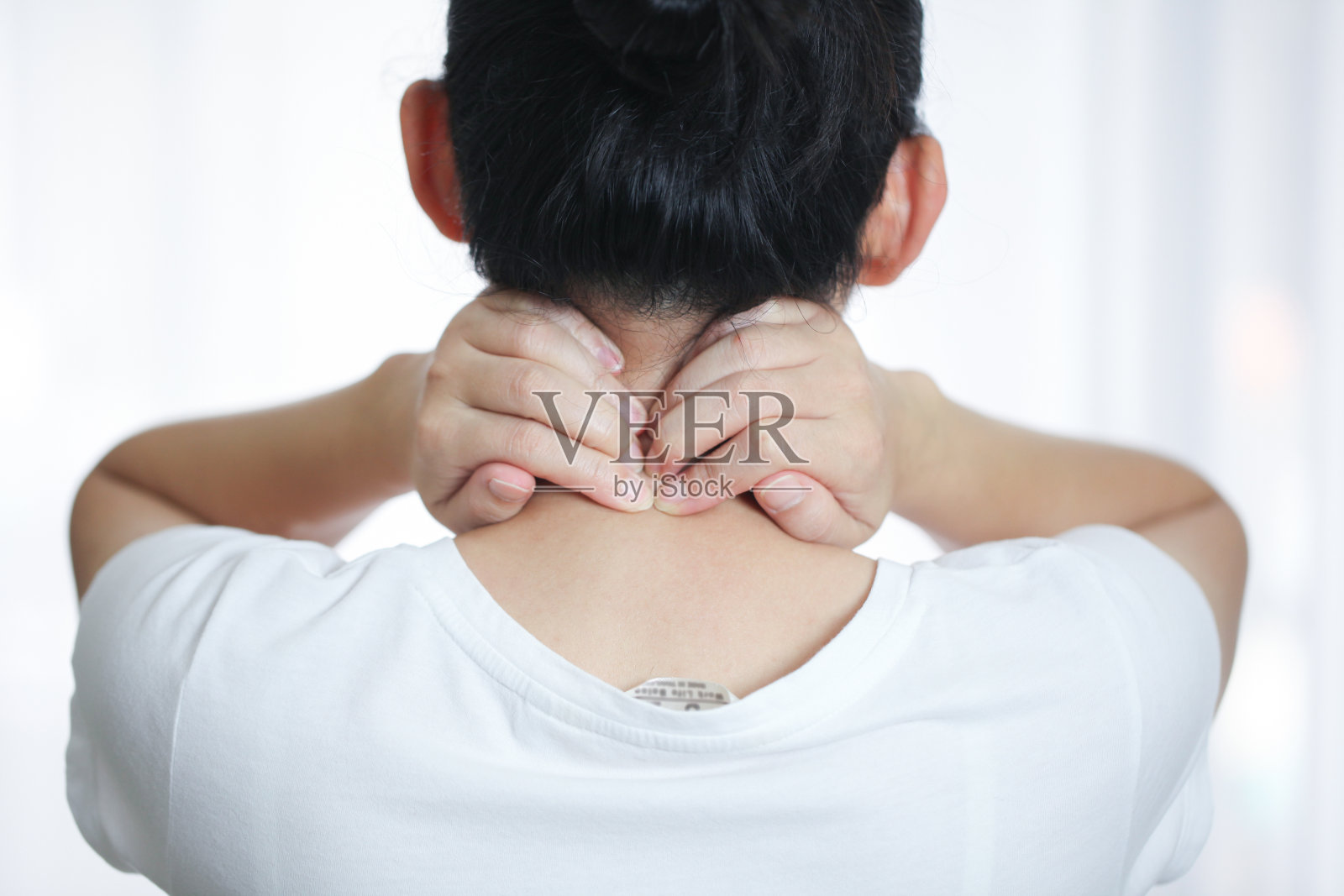 女性颈部疼痛照片摄影图片