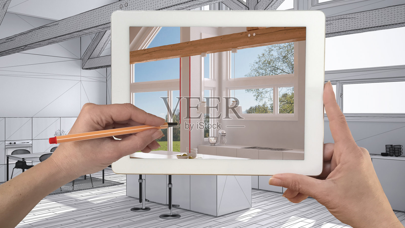 手握着并在平板上绘制显示真正完成的极简主义白色和木制厨房。现代厨房效果图为背景，建筑室内设计呈现照片摄影图片