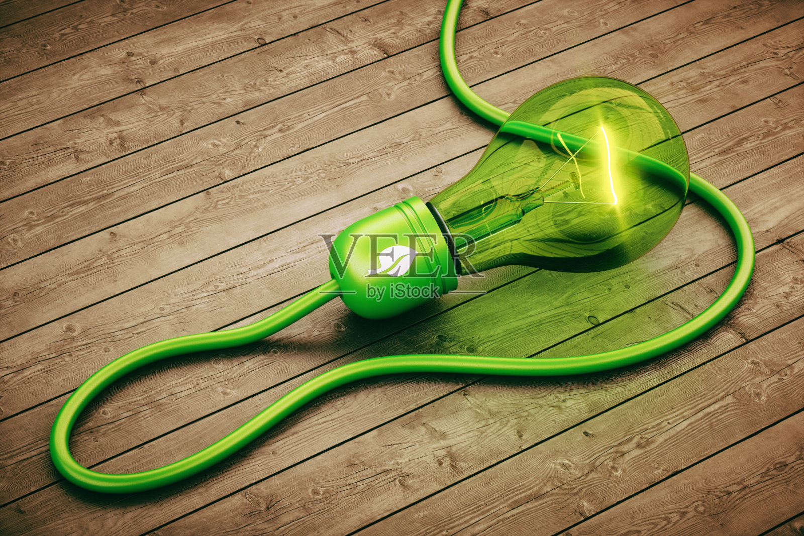 抽象的绿色灯泡在硬木地板上微微发光照片摄影图片