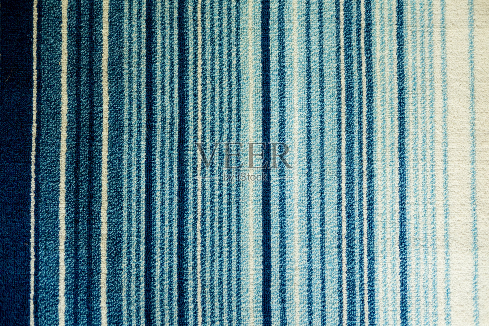 织物地毯的纹理有白色和蓝色的条纹图案照片摄影图片