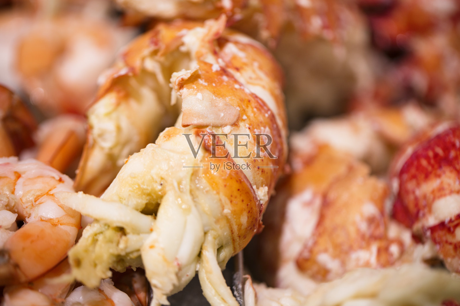 海鲜市场的新鲜熟龙虾肉照片摄影图片