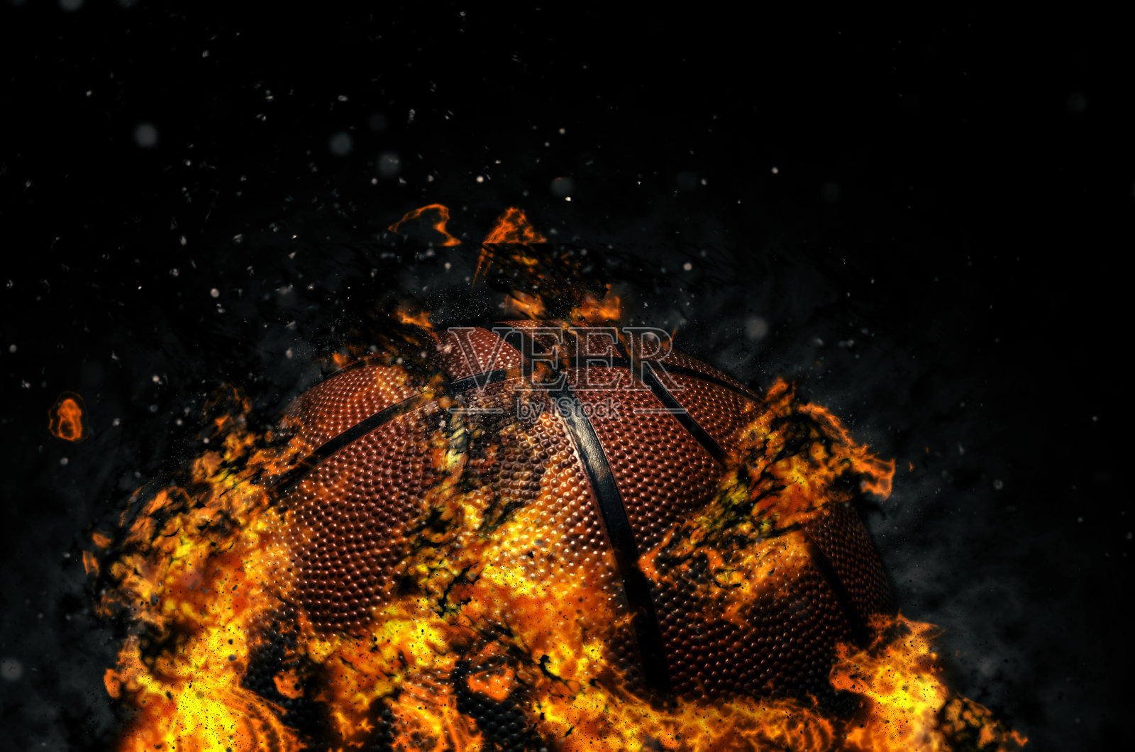 篮球在黑色背景与火照片摄影图片