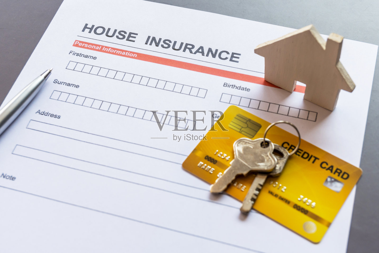 房屋保险表格与模型和政策文件照片摄影图片