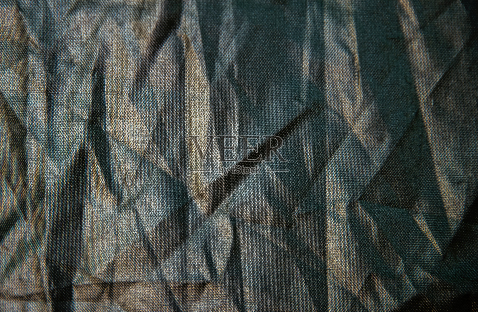 深蓝皱化纤织物的纹理照片摄影图片