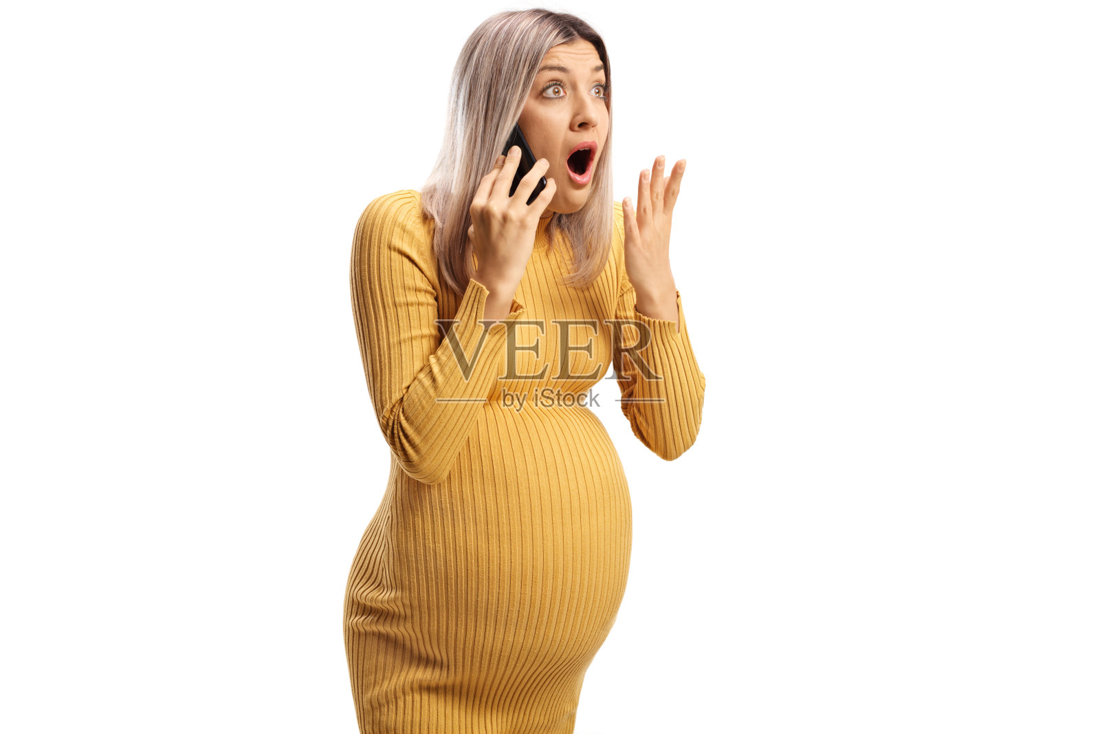 震惊的孕妇打电话照片摄影图片