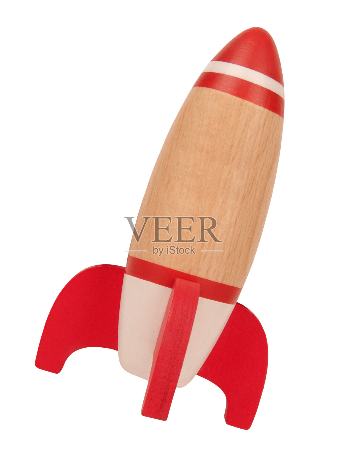 木制玩具火箭被隔离在白色背景上。复古记忆童年概念。为孩子梦想太空的想法照片摄影图片