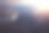 日落时从降落飞机窗口俯瞰城市素材图片