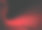 红色发光的图形波在黑色的背景素材图片