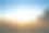 初夏清晨，薄雾笼罩的田野上美丽的日出素材图片
