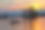 湖景渔民钓鱼伊利，边界水独木舟地区，美国明尼苏达州，日落素材图片