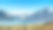 美丽的蓝色特卡波湖(新西兰)，望向南阿尔卑斯山的方向素材图片